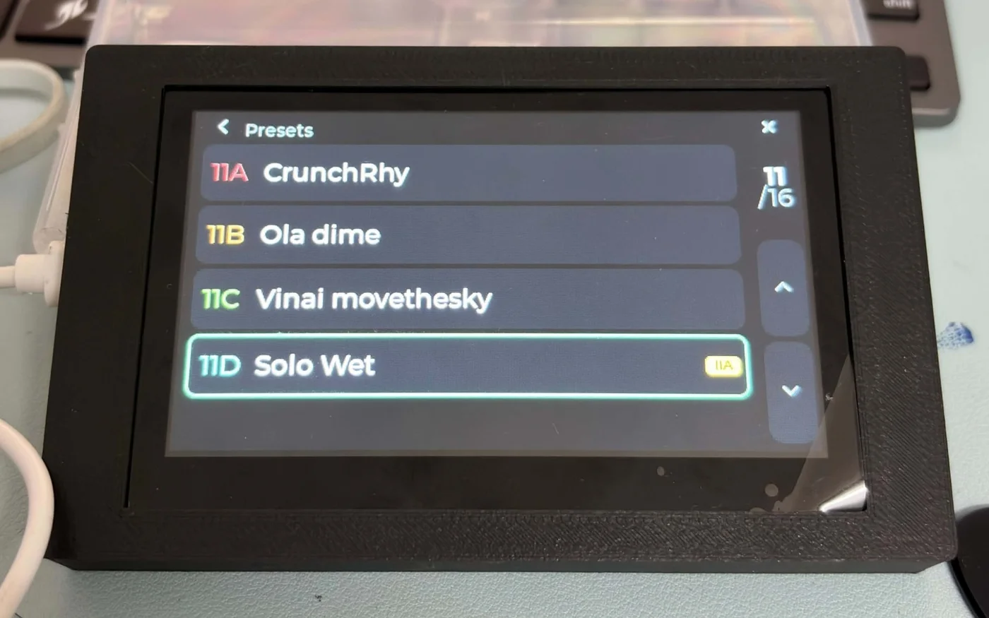 The JC4827W543 showing the presets list, page 11 of 16, with 11D Solo Wet picked